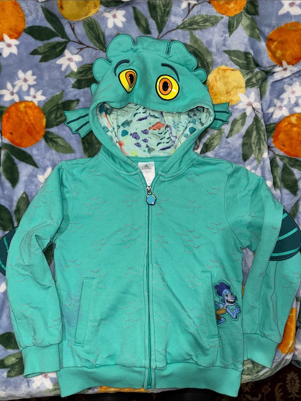 Disney Hooded Zip-Up Sweatshirt in 9/10 condition. Kids 5/6 from movie Luca!